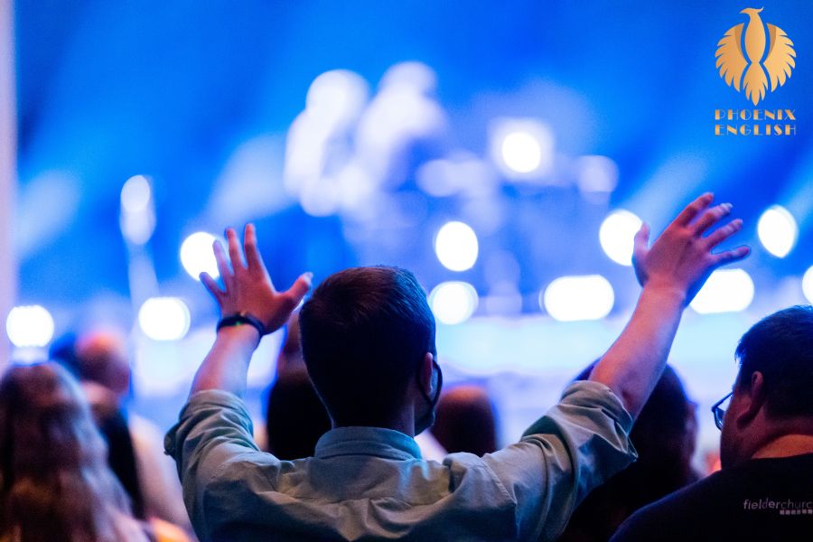 an pic about A man cheering in a stadium