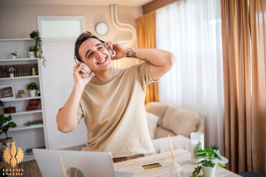 an image about A boy who is happy to listen to music