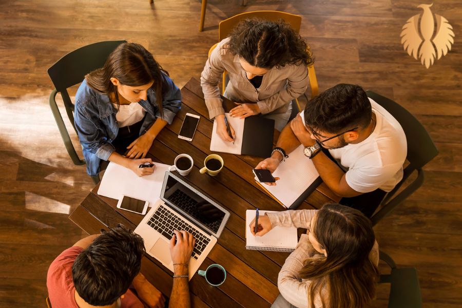 A photo about several people studying in a group