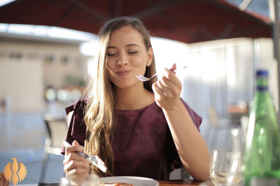 A photo about a lady eating something