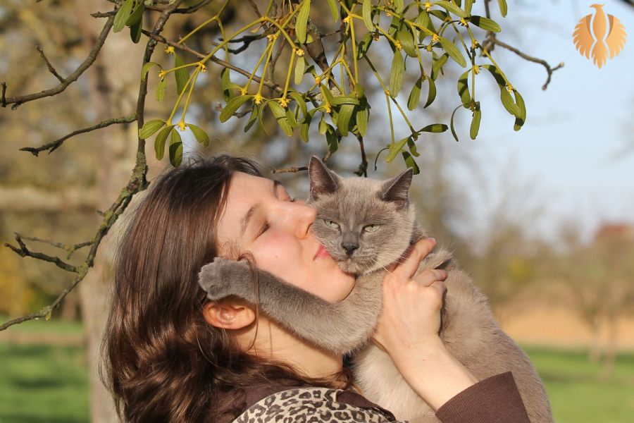 A photo about a woman hugging her pet