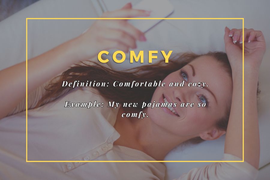 Smiling woman lying in bed with a phone, looking comfortable and relaxed – vocabulary word 'Comfy